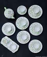Overhead view of full 24-piece Tuscan Shamrock tea set
