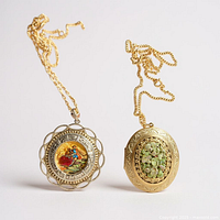 Both pendant necklaces side by side showing overall design