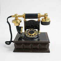 Front view of Western Electric wood desk telephone showing rotary dial and handset