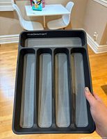 Top view of the utensil drawer organizer showing five compartments and the brand name made smart.