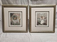 Pair of framed Angel Heart prints by Catherine Simpson on a white backdrop, showing full frames and mats.