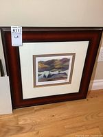 Framed art print showing overall condition and presentation of the lot