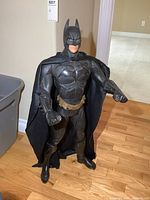 Front view of the 31-inch tall Batman figure showing detailed costume and facial features with cape spread.