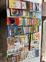 Overview of children's books in the lot featuring titles with colorful illustrated covers, arranged in rows.