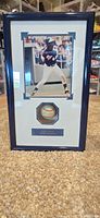 Front view of entire framed display showing photo, signed baseball and plaque