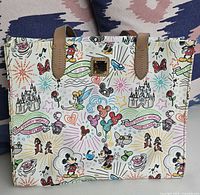 Front view of tote bag on patterned background showing full sketch print and leather handles