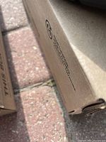 Close-up image of shoebox label confirming brand, size, and style details.