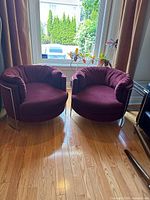 Front view of both chairs positioned side by side by a window