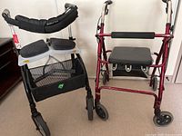 Two foldable walkers together showing design and condition