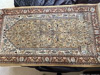 Full view of the 3ft x 5ft rug showing floral central design and multiple borders