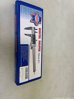 Blue box labeled 'Digital Caliper 150mm (6" )' with brand 'SENTAR'