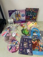 Full lot arrangement on table showing all items together, assorted kids craft and accessory items