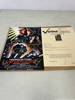 Signed 8x12 Blade Runner photograph with multiple gold marker signatures and Certificate of Authenticity.