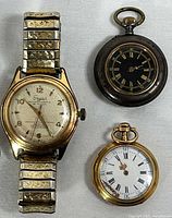 Front view of all three timepieces