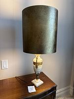 Full view of lamp with shade illuminated