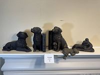 Full lot showing five pieces on mantel