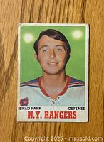 Front side of 1970-71 O-Pee-Chee Brad Park rookie hockey card showing player photo, name, position, and team.