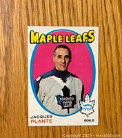 Front side of 1971-72 O-Pee-Chee Jacques Plante hockey card showing player image and team.