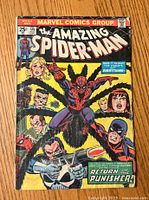 Front cover of Marvel comic book The Amazing Spider-Man #135 showing Spider-Man and The Punisher artwork. Visible creases and wear on cover.