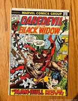 Front cover of Daredevil #95 comic featuring Daredevil and the Black Widow with a dynamic action scene and text 'The Man-Bull makes his move'.