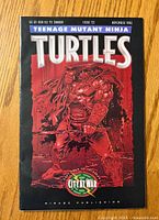 Front cover of TMNT comic issue 53 showing a samurai warrior character with swords on a red background with publication details