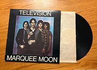 Front of the album cover showing the band members and album title 'Marquee Moon' by Television.