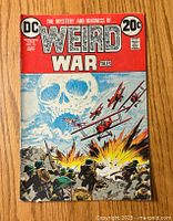 Front cover of Weird War Tales #15 comic book showing soldiers, biplanes, and explosions with red and blue illustration.