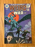 Front cover of Weird War Tales #23 comic showing skeleton soldier with winged horse and soldiers on the ground in a colorful war scene.