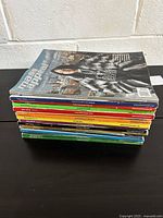 Stack of 15 Mass Appeal vintage magazines showcasing colorful spines and some cover text