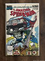 Front cover of The Amazing Spider-Man Annual #23 comic book showing artwork of Spider-Man and other characters from an Atlantis Attack storyline.