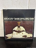 Front cover of sealed vinyl record by Anthony ‘Reebop’ Kwaku Bah showing the artist in traditional attire.