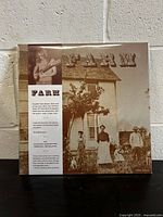 Front cover of the sealed Farm vinyl record showing vintage photo and text.