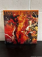Front cover of the sealed vinyl record showing artistic abstract cover and title Bacchanal Gabor Szabo.