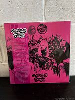 Front cover of Haymarket Square Magic Lantern vinyl album in sealed pink psychedelic artwork.