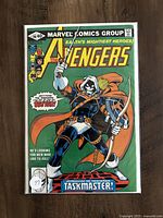 Front cover of The Avengers #196 comic book showing Taskmaster in costume with bow and arrow, green background, Marvel Comics Group branding, 40 cent price, issue number and logo, some character headshots on left
