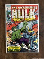 Front cover of The Incredible Hulk #126 comic book showing Hulk and armored opponent fight scene.