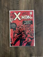 Front cover of X-Men comic book issue 17 showing artwork and title in good preserved condition.