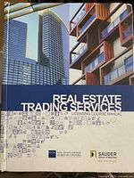 Photo of manual cover showing title and publisher logos.