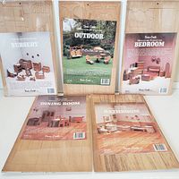 Five Dura-Craft miniature dollhouse furniture kits unopened in original packaging with clear views of themes and branding