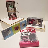 All items together including mugs, salt & pepper shakers, picture frame, and gel back pad.