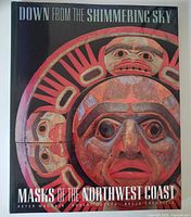 Front cover of the book showing the title and a large traditional native ceremonial mask image