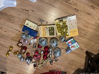 Top view of full assortment of ornaments and boxed sets spread on floor