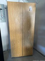 Front view of cabinet with doors closed