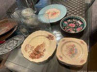 Overall group of assorted plates, bowls and glassware on table