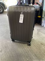 Front view of larger suitcase