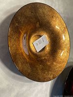 Gold-bronze glass bowl interior
