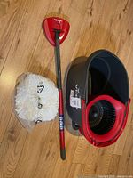 Mop handle, sealed mop head, bucket with wringer overview