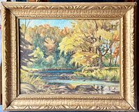 Frontal view of the framed oil painting showing the river landscape and signature.