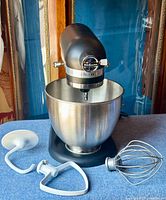 Front view of mixer assembled on base with mixing bowl