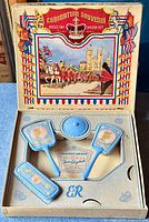 Toy brush set in original box, inside lid showing coronation procession and set description